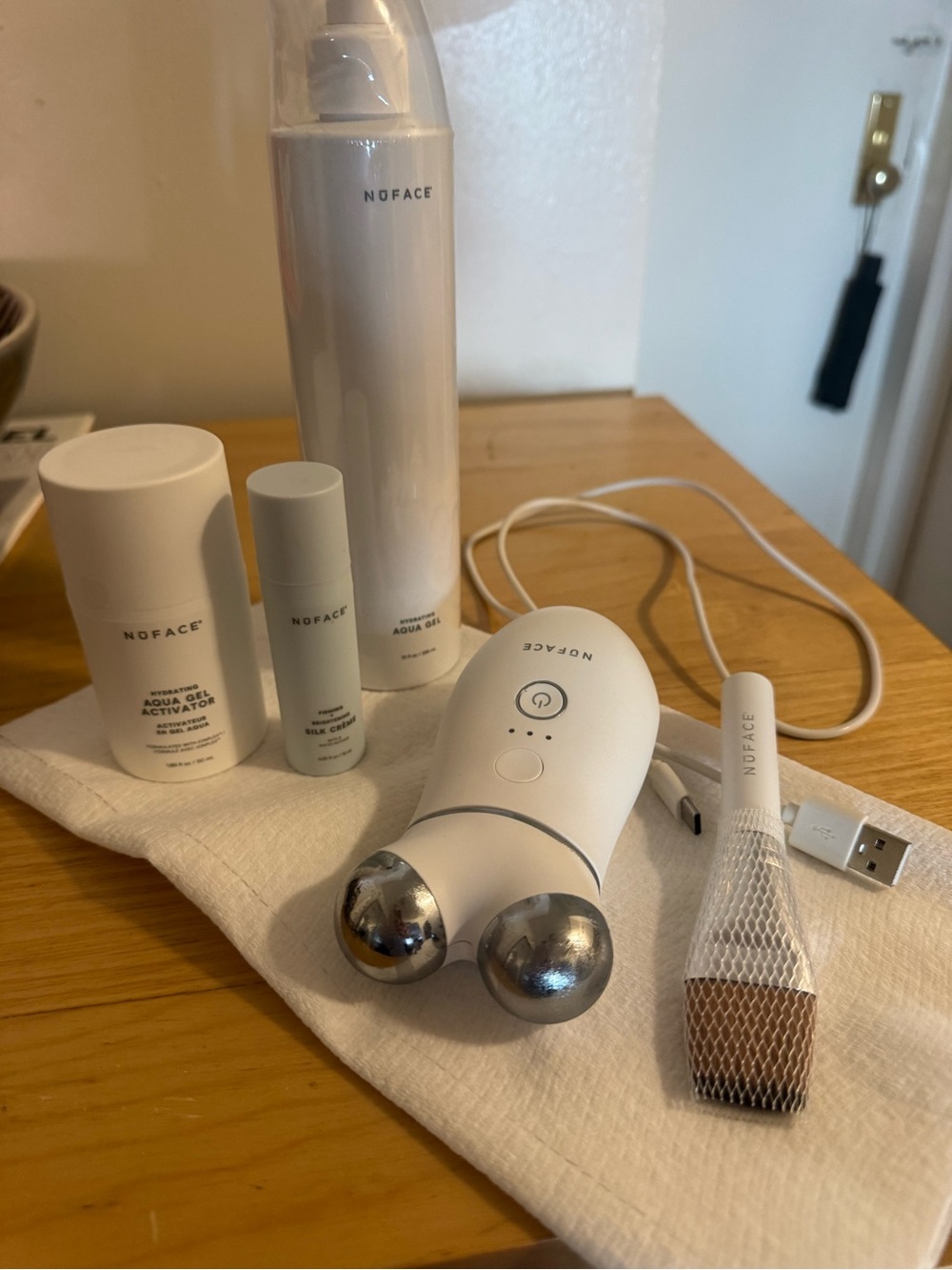 NuFace Trinity Starter Kit with activator gel, application brush and charger